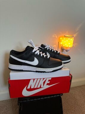 Nike Men’s Black and White Low-Top Sneakers with White Swoosh